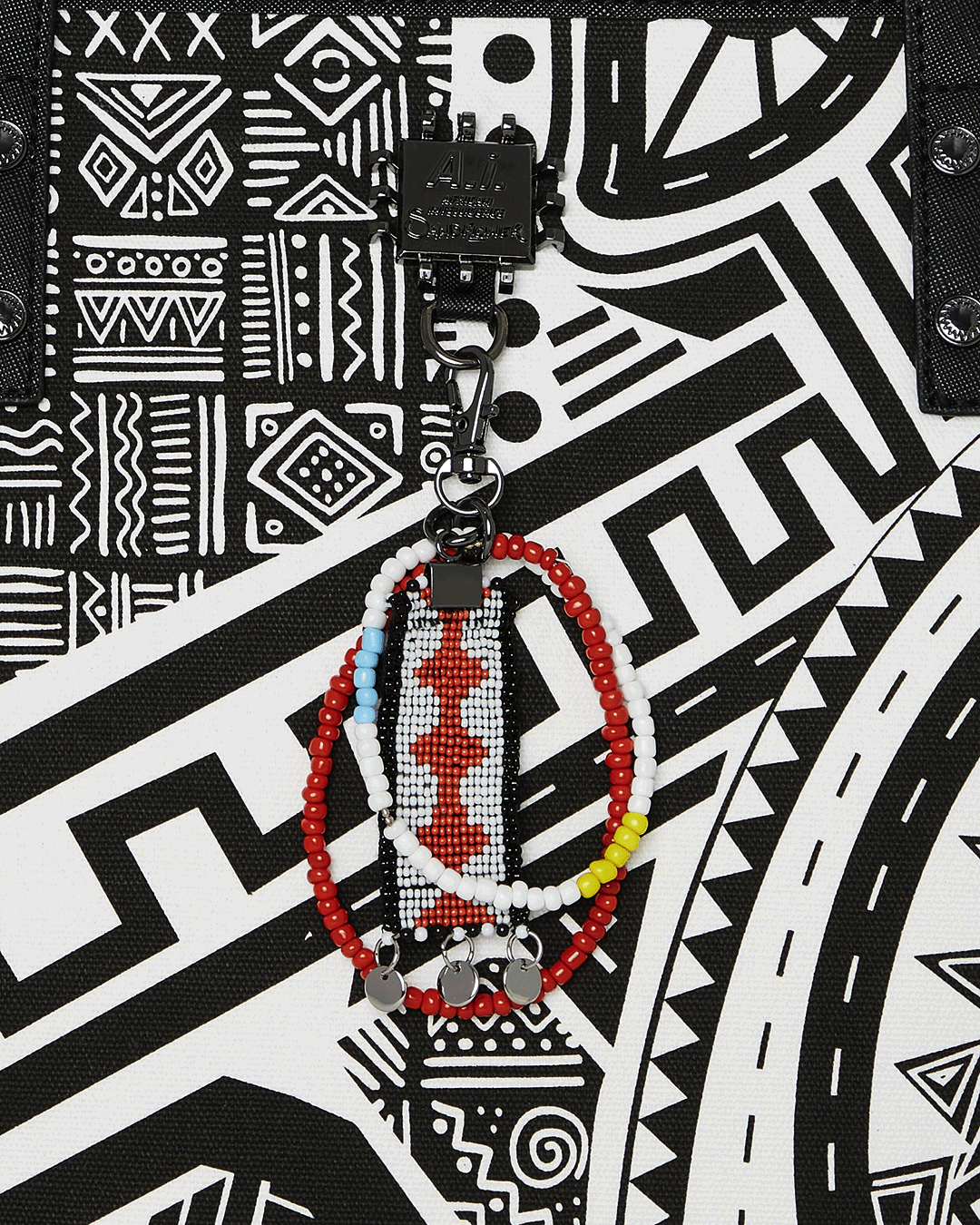 A.I. AFRICAN INTELLIGENCE THE SKYHAWK WING TOTE - SANDFLOWER COLLAB